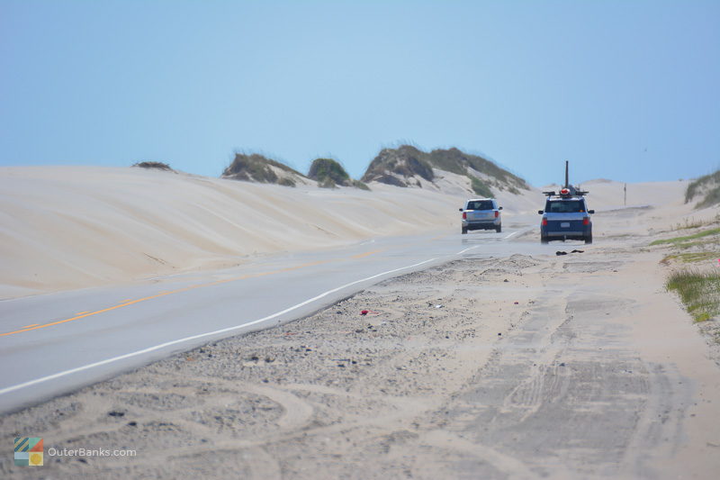 Man-made dunes line NC 12 through the tri-villages of Rodanthe, Waves and Salvo